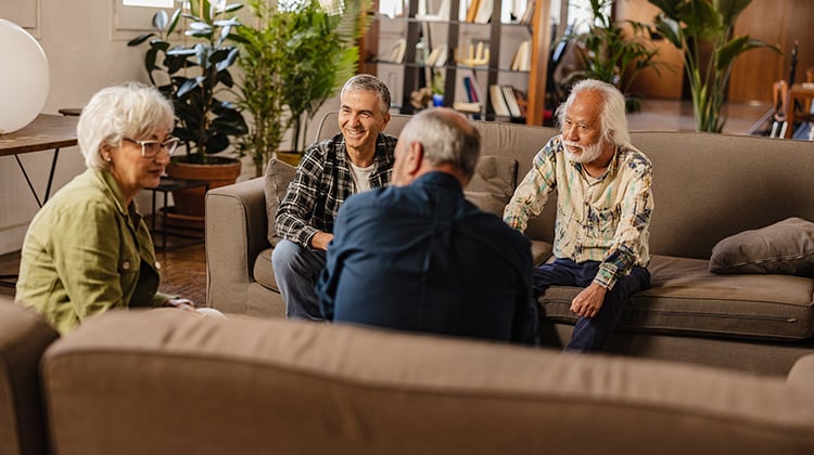 Group of Older Adults Discussing Spiritual Wellness in Senior Living