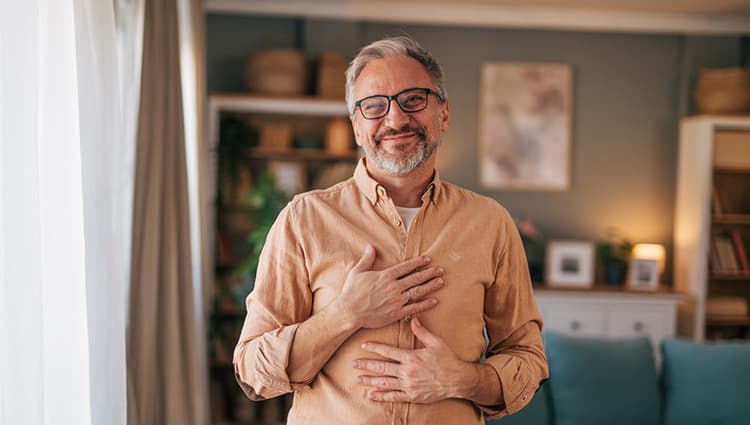 Happy relaxed senior man with beard