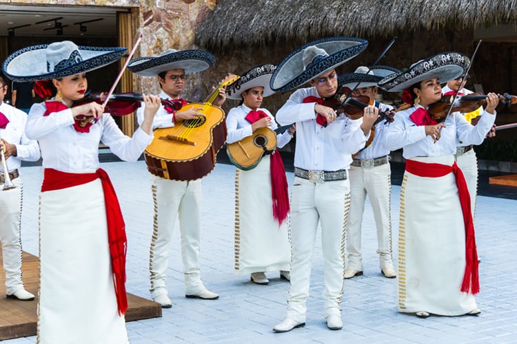Mariachi band dressed in white