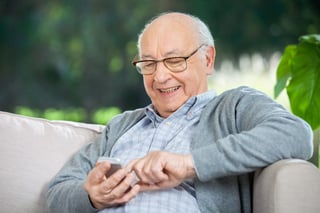 Essential Technology Older Adults | Man Using Smart Phone