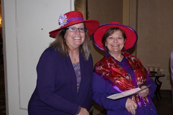 red hats at Presbyterian Senior living