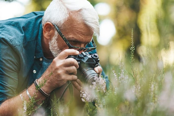 Senior Man with DSLR camera