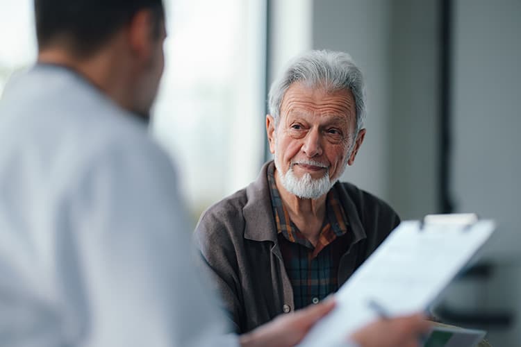 Senior Man talking to doctor