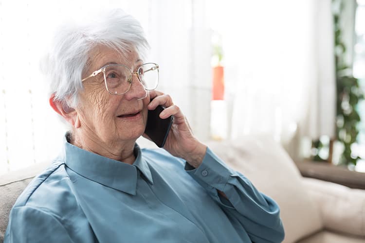 Senior Woman with Dementia Talking on Cell Phone (1)