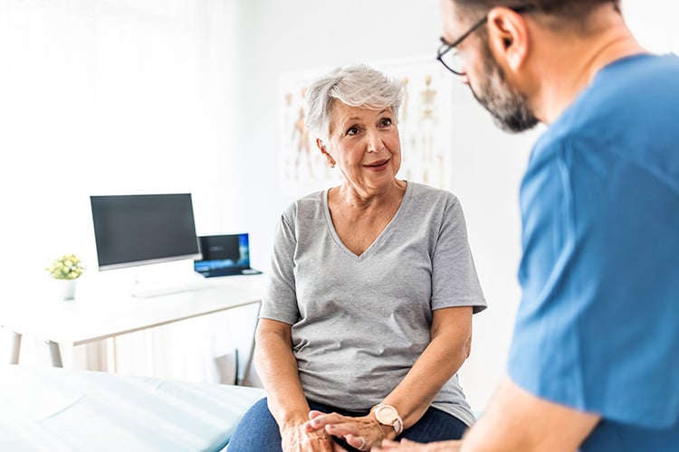 Senior woman Talking with Doctor