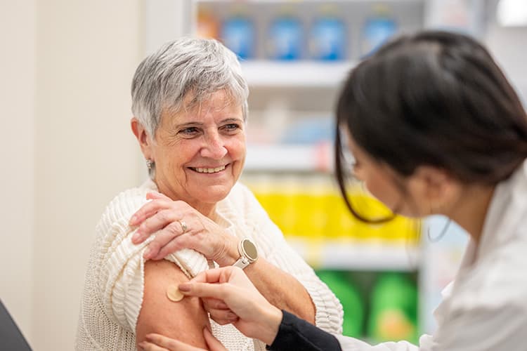 Senior Woman getting a vaccination 