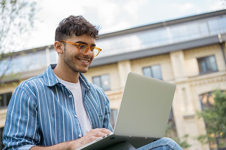 Young male employee completing online Employee Assistance Program