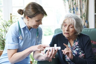 nurse-and-eldery-woman-medicine.jpg