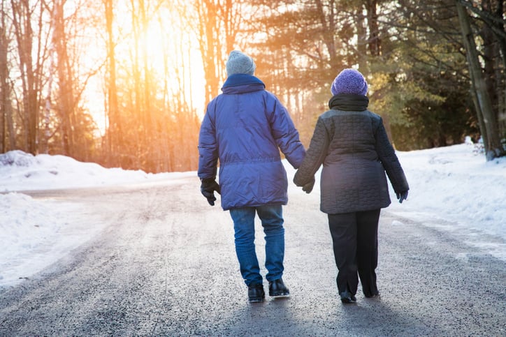 senior couple walking in the winter