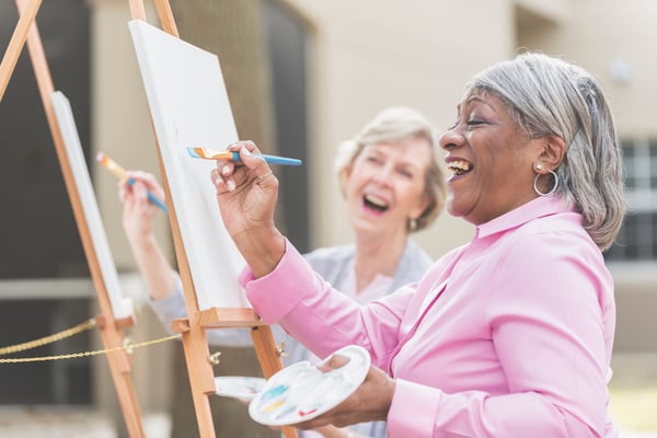 Older women painting together 