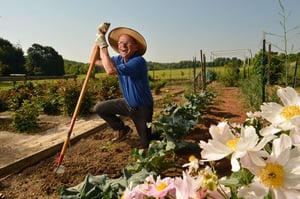 man gardening with shovel