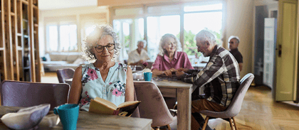 woman reading book chapter photo 2